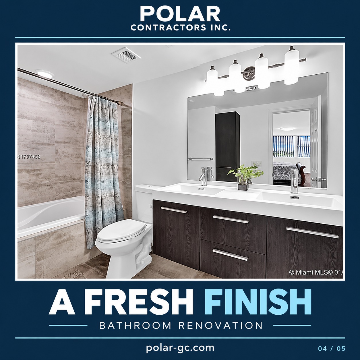 Finished bathroom renovation with double vanity and tiled tub