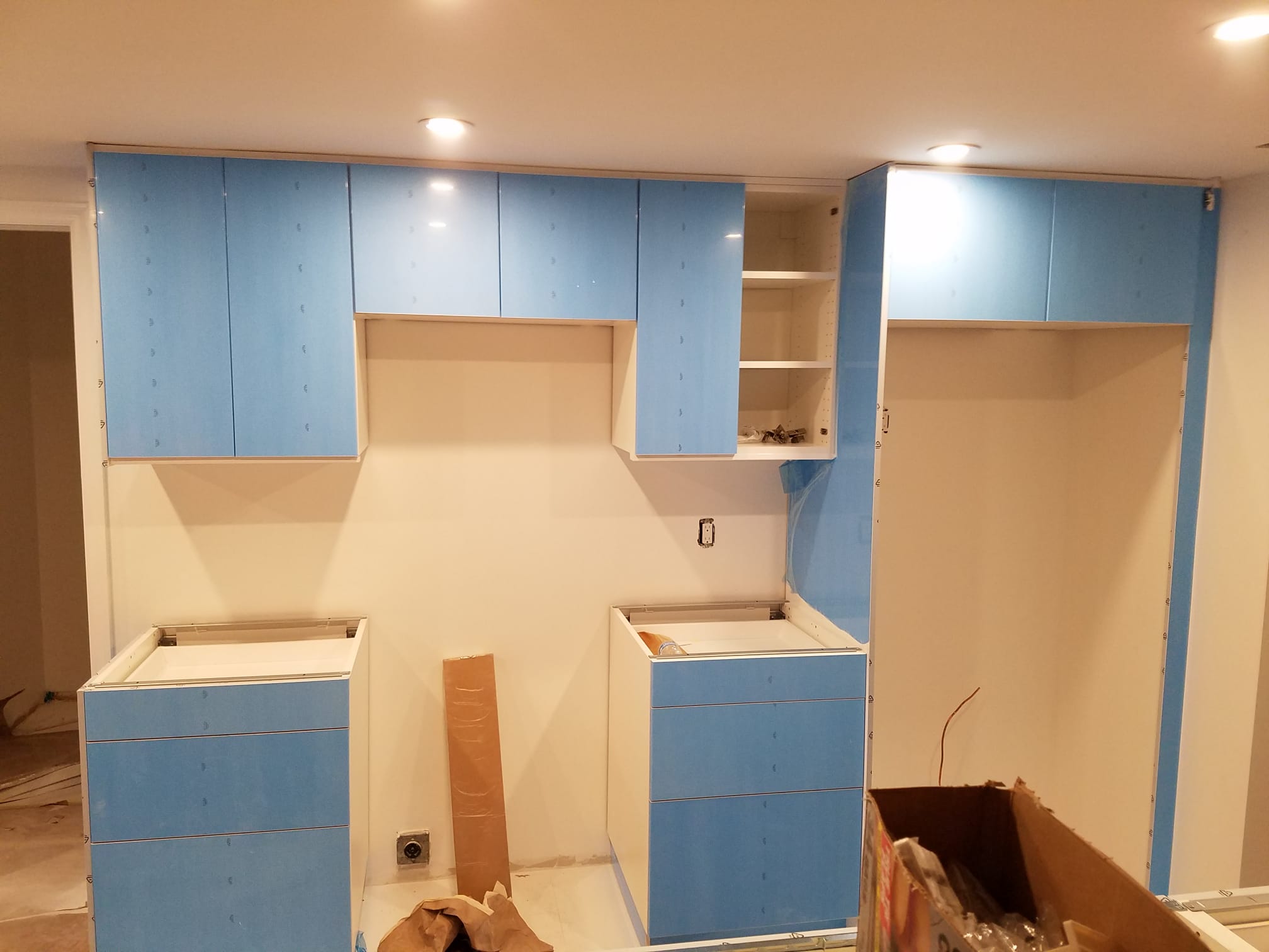 Kitchen cabinetry installation in progress